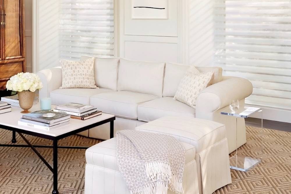 Bright Living room with multiple couches and chairs decorated with decorative throw pillows near Danville, CA